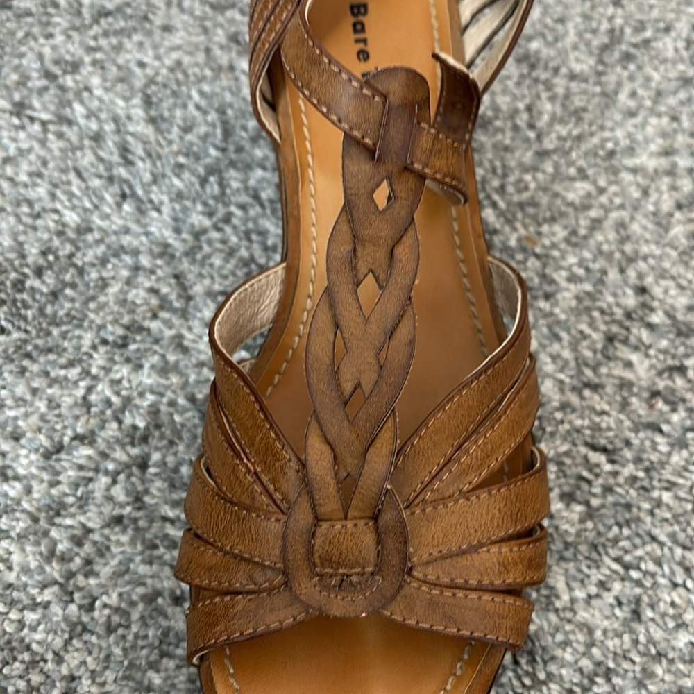 Cognac colored strappy sandals, 1-2” platform, side buckle.